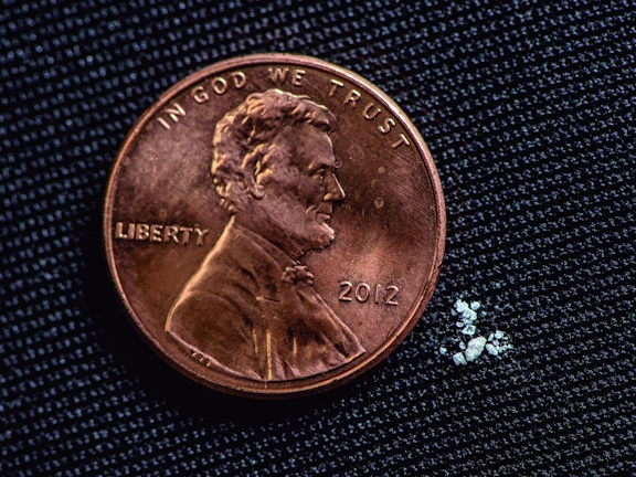 Comparison of a U.S. penny to a potentially lethal dose of fentanyl. (U.S. Drug Enforcement Administration)